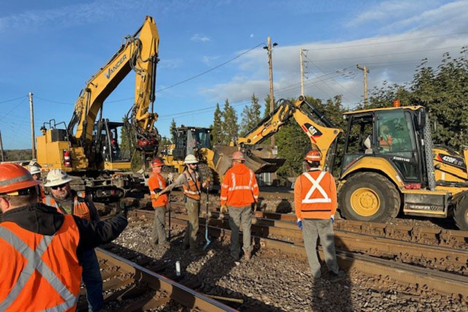 Engineering teams pause frequently to discuss job safety. 