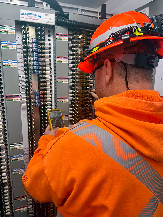 Locke checks track circuit voltages. 