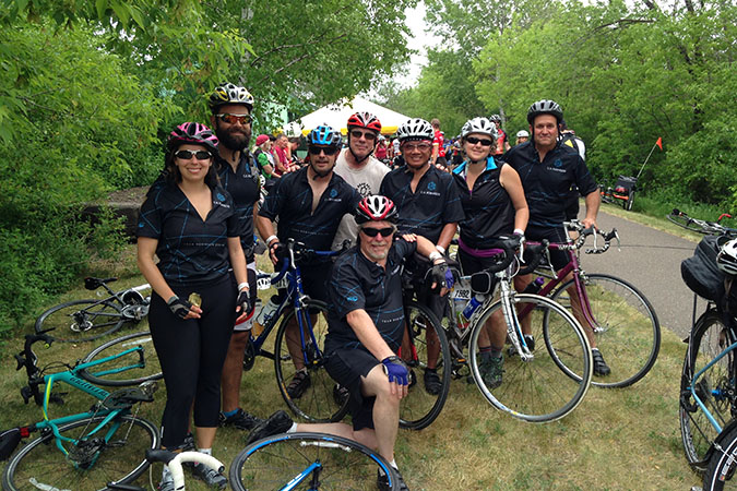 Fisher with other railroaders at the MS150 cycling ride. From left -- Maria Morgan, Jonathan Morgan, Fisher, Roger McGowan, Tu Tran, Carla Jacobson, Phil Peters, and in the Front Mark Duell 